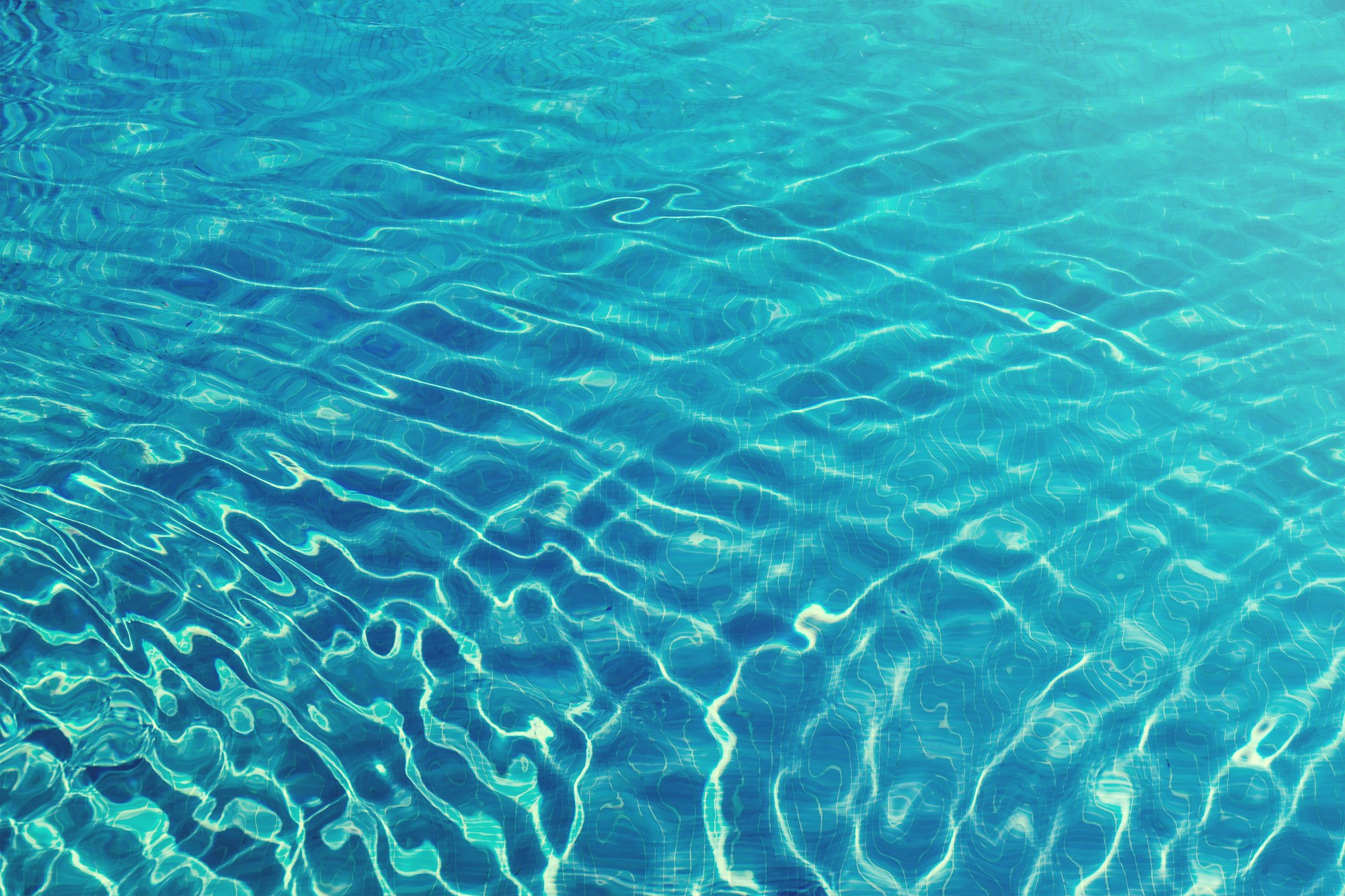 Close-up of rippling blue pool water